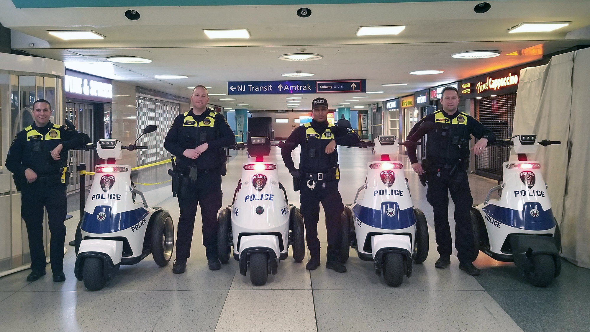 APD Officers with Vehicles at New York - Penn Station